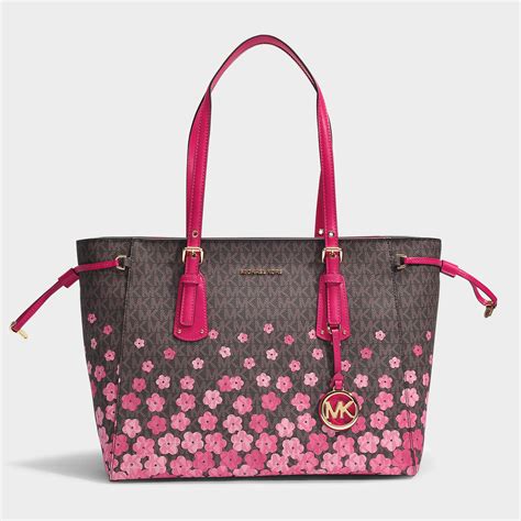 michael kors backpack floral|tan Michael Kors bag.